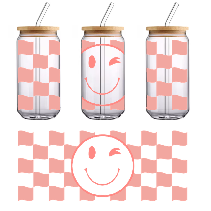 A pink and red winking smiley face.UV Transfers