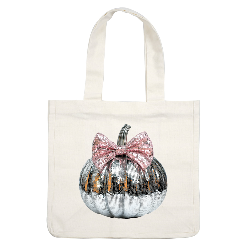 Shiny silver sequin pumpkin adorned with a stylish pink bow, perfect for festive decorations and adding glam to any空间. heat press transfers