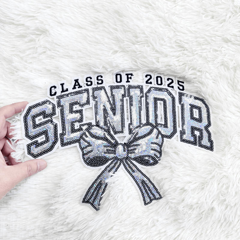 A shiny, sequined patch reads "SENIOR Class of 2025".Patches