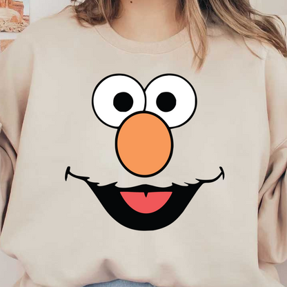 This is a fun, colorful cartoon face featuring large eyes, a prominent orange nose, and a playful smile.DTF Transfers