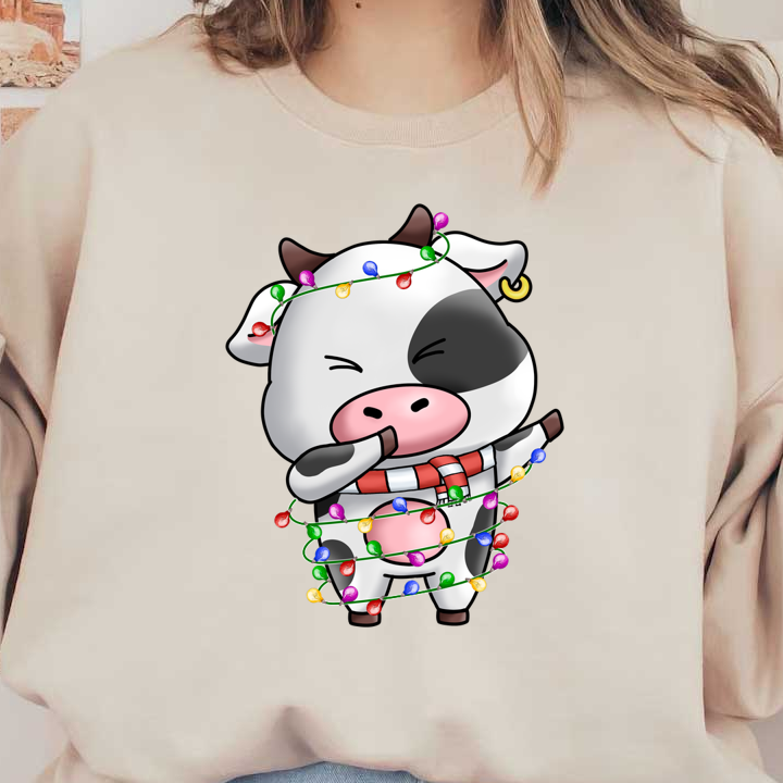 A cute cartoon cow wrapped in colorful Christmas lights, wearing a striped scarf and playfully shushing. heat press transfers