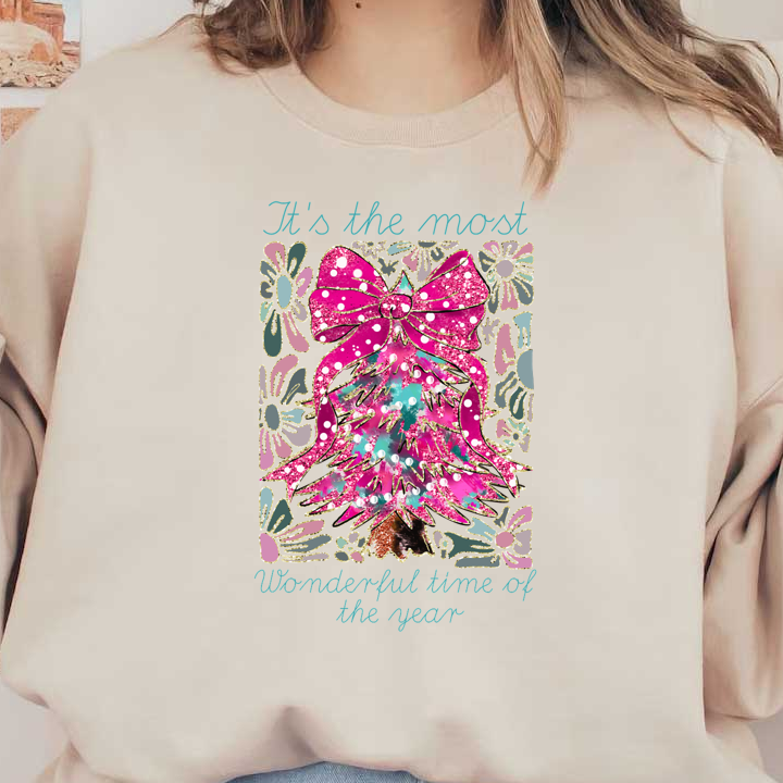 A vibrant, glittery design featuring a pink Christmas tree and floral accents, celebrating the "most wonderful time of the year."DTF Transfersdtf regular iron