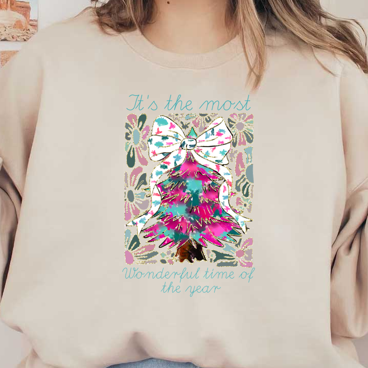 A vibrant and festive design featuring a colorful Christmas tree with a bow, accompanied by cheerful floral accents and a joyful message.DTF Transfers heat press transfers