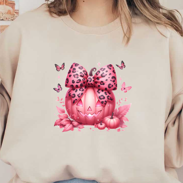 A whimsical pink pumpkin adorned with a leopard print bow, surrounded by butterflies and autumn leaves, perfect for Halloween decor. heat press transfers