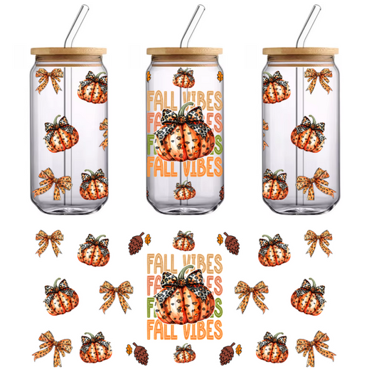 A vibrant fall-themed design featuring striped pumpkins, leaf accents, and playful bows, all expressing cozy autumn vibes.UV Transfers dtf transfers