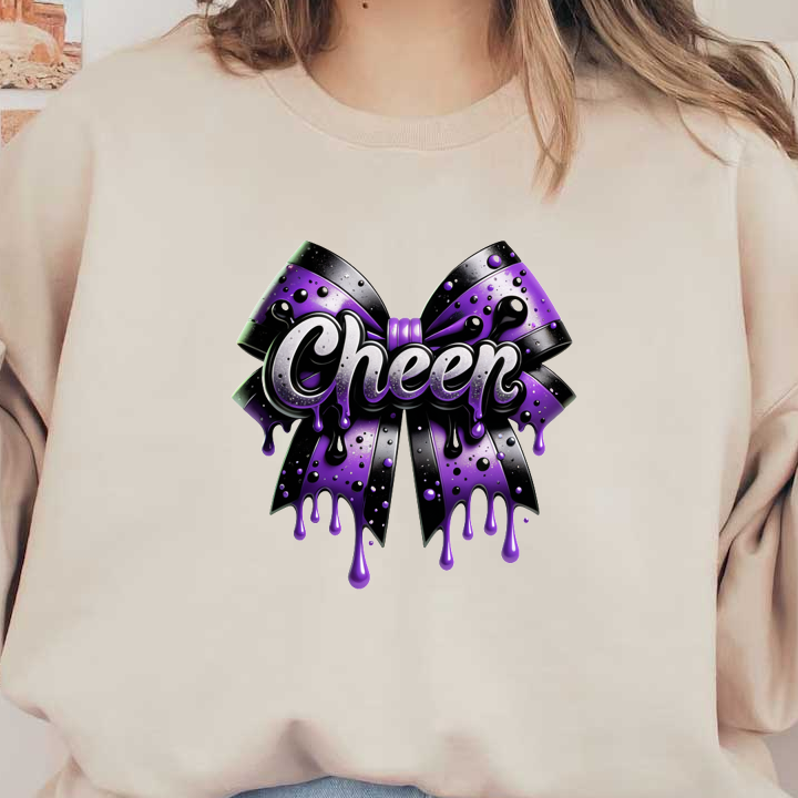 Un lazo negro y morado vibrante que presenta la palabra "Cheer" con un efecto brillante y goteante para un toque divertido. Transferencias DTF