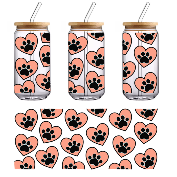 A playful pattern featuring pink hearts adorned with black paw prints on a black background, perfect for animal lovers!UV Transfersdtf regular iron