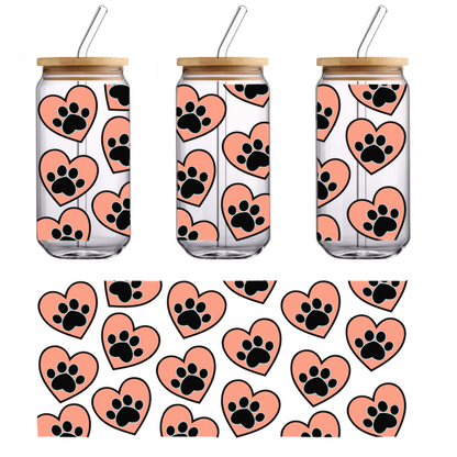 A playful pattern featuring pink hearts adorned with black paw prints on a black background, perfect for animal lovers!UV Transfersdtf regular iron