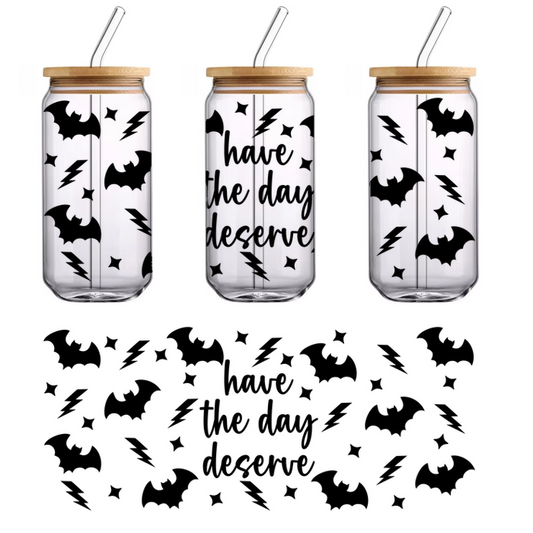 This image features a simple, stylized silhouette of a cat, emphasizing its elegant shape and playful nature.UV Transfers