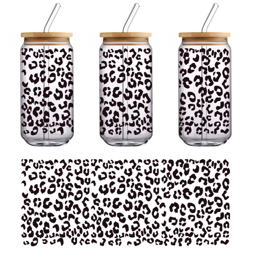 A vivid green leopard print background with black spots.UV Transfers