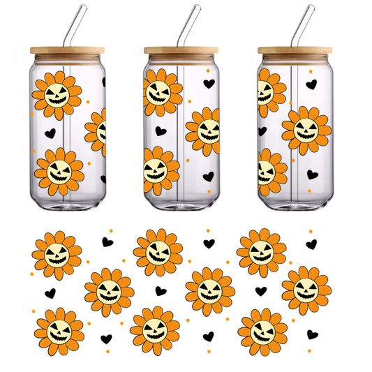 A cheerful Halloween-themed design featuring vibrant orange flowers with playful pumpkin faces set against a black background.UV Transfersdtf regular iron