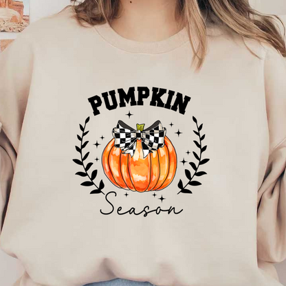 A vibrant orange pumpkin adorned with a stylish black and white checkered bow, perfect for autumn decorations. heat press transfers