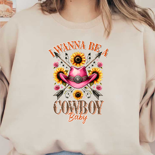 Este diseño vibrante presenta un sombrero de vaquero rosa rodeado de girasoles y flechas, con la divertida frase "Quiero ser un bebé vaquero".