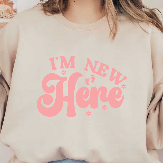 A playful design featuring the phrase "I'm New Here" in stylish pink lettering, perfect for welcoming newcomers.DTF Transfers