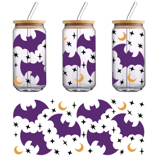 A playful pattern featuring purple bats and crescent moons set against a black background, perfect for Halloween decor!UV Transfers heat press transfers