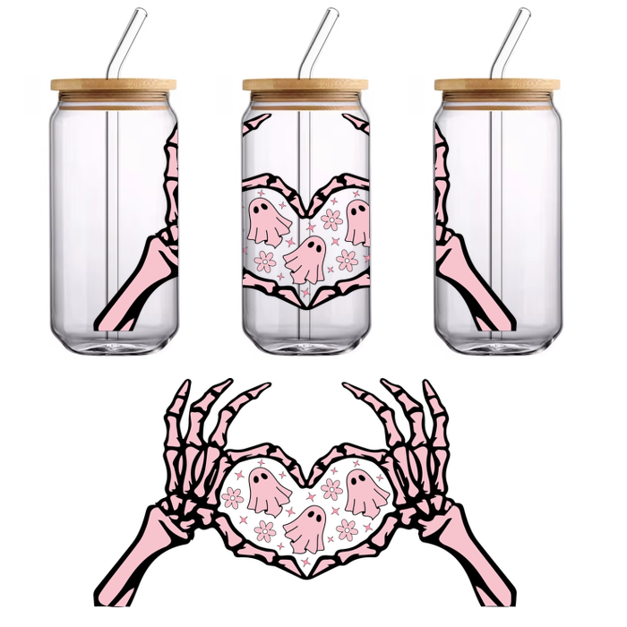 A playful design featuring pink skeleton hands forming a heart with cute ghosts and flowers inside.UV Transfersdtf regular iron