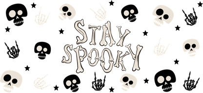 A fun and spooky design featuring the phrase "STAY SPOOKY" surrounded by playful skulls and spooky hand symbols.UV Transfers dtf prints