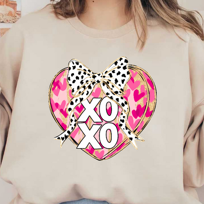 A vibrant heart design featuring pink hues, leopard print bow, and bold "XOXO" lettering, perfect for expressing love and affection.DTF Transfers