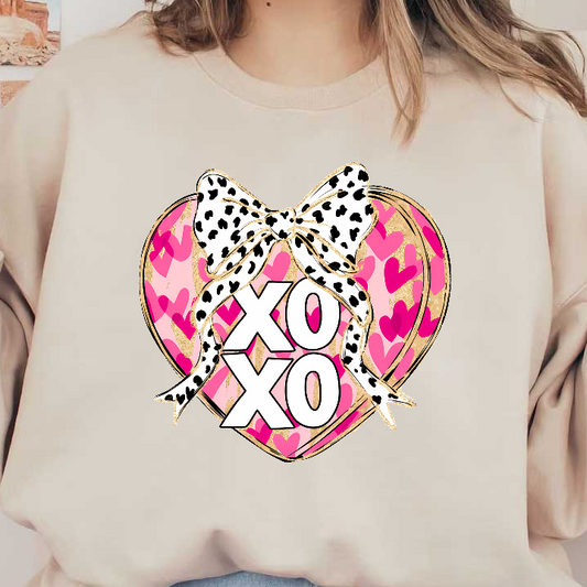 A vibrant heart design featuring pink hues, leopard print bow, and bold "XOXO" lettering, perfect for expressing love and affection.DTF Transfers