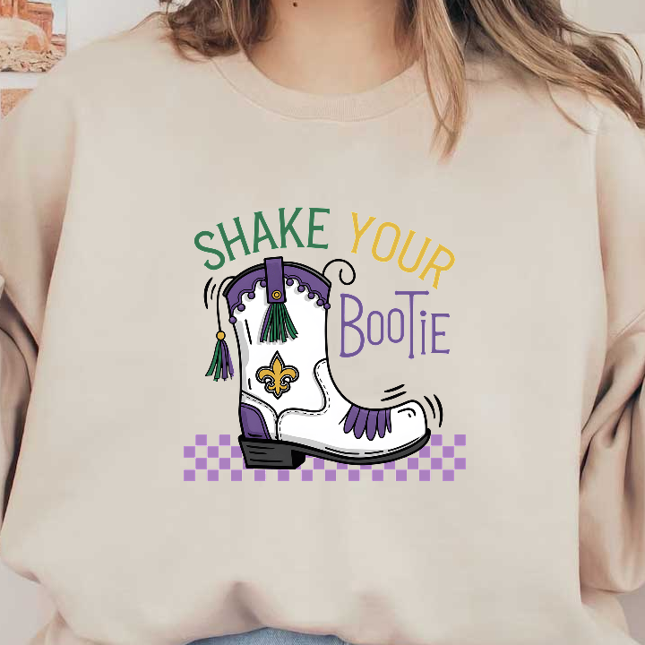 Lively illustration of a decorated white boot with purple and green accents, featuring the playful phrase "Shake Your Bootie."DTF Transfers