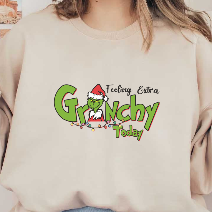 A playful holiday-themed design featuring the Grinch wearing a Santa hat, accompanied by the words "Feeling Extra Grinchy Today."DTF Transfers dtf transfers dtf prints