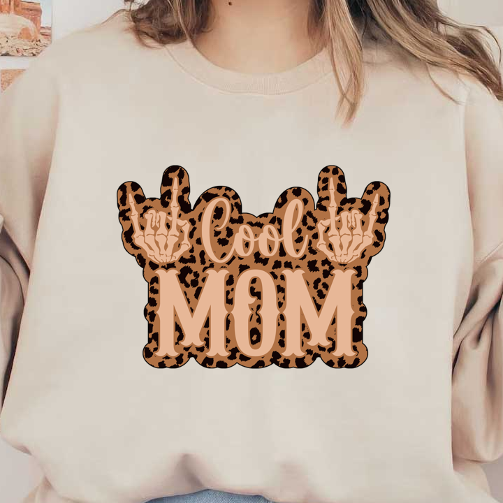 A trendy design featuring the phrase "Cool MOM" with skeleton hands and a leopard print background, perfect for fun occasions! heat press transfers