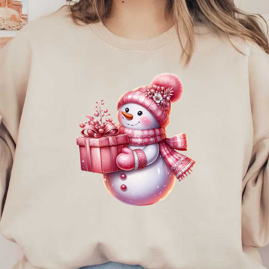 A cheerful snowman in a pink knitted hat and scarf holds a festive pink gift, adorned with flowers and snowflakes.dtf regular iron