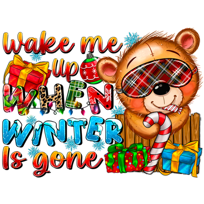 A cheerful, cartoonish bear in pajamas holding a candy cane, surrounded by colorful gifts, with the playful text, "Wake me up when winter is gone."DTF Transfers heat press transfers