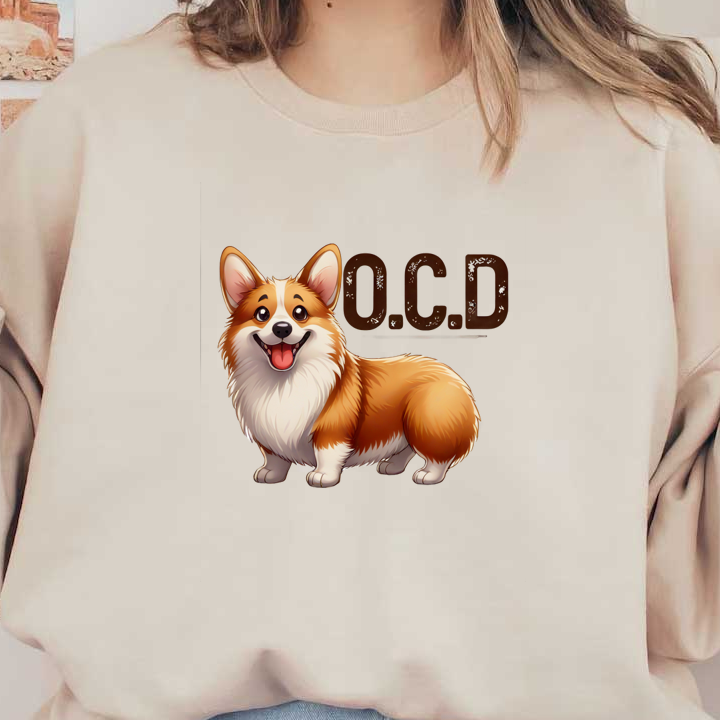 Esta divertida ilustración presenta un corgi feliz junto al acrónimo humorístico "OCD" (trastorno obsesivo del corgi).