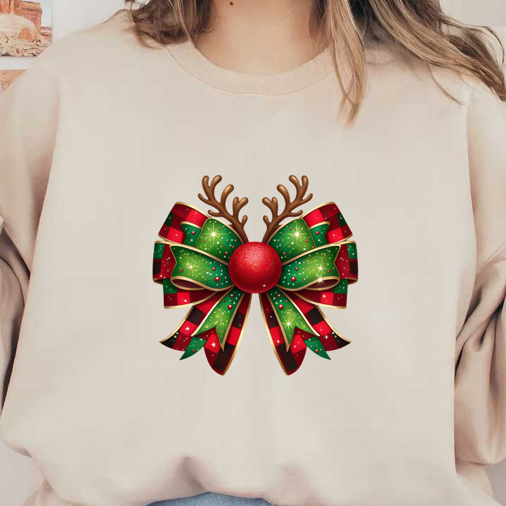 A festive Christmas bow featuring green and red ribbons with star patterns, topped with a red ball and reindeer antlers. heat press transfers