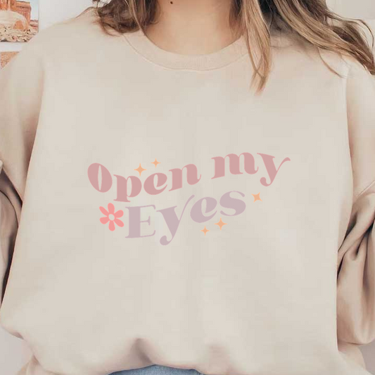 Un diseño de texto divertido y colorido que presenta la frase "Abre mis ojos" con estrellas decorativas y un detalle floral.