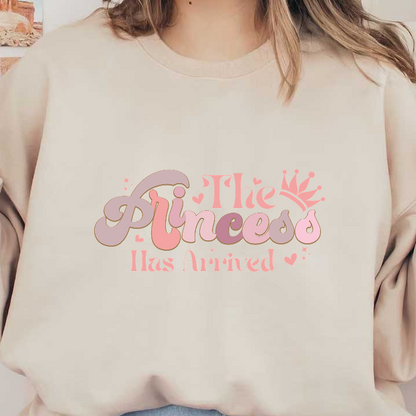 Celebrate with this charming "The Princess Has Arrived" design, featuring playful lettering and a cute crown, perfect for special occasions!DTF Transfers