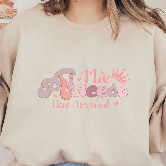 Celebrate with this charming "The Princess Has Arrived" design, featuring playful lettering and a cute crown, perfect for special occasions!DTF Transfers