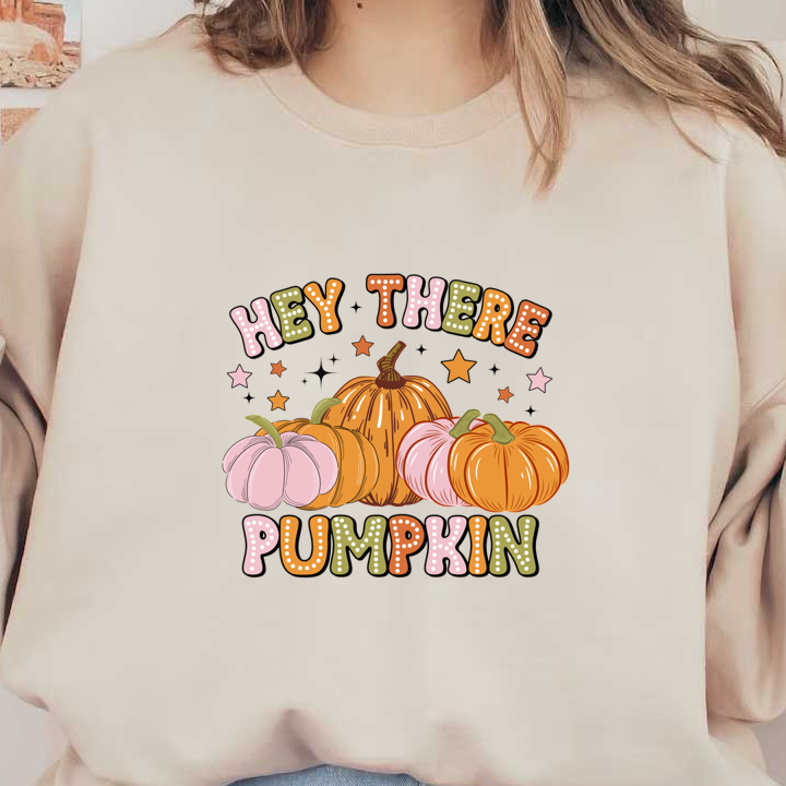 A cheerful design featuring colorful pumpkins with the playful phrase "Hey There Pumpkin" and surrounding stars.dtf regular iron