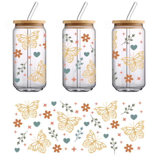 A vibrant floral pattern featuring delicate butterflies, hearts, and flowers in soft pastel colors on a dark background.UV Transfers dtf transfers