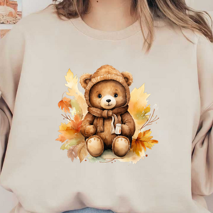 Adorable oso de peluche marrón con una acogedora sudadera con capucha y bufanda, sosteniendo una taza, rodeado de coloridas hojas de otoño.