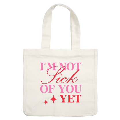 A playful and colorful graphic that reads, "I'M NOT Sick OF YOU YET," featuring vibrant pink and red lettering with sparkling accents.DTF Transfers