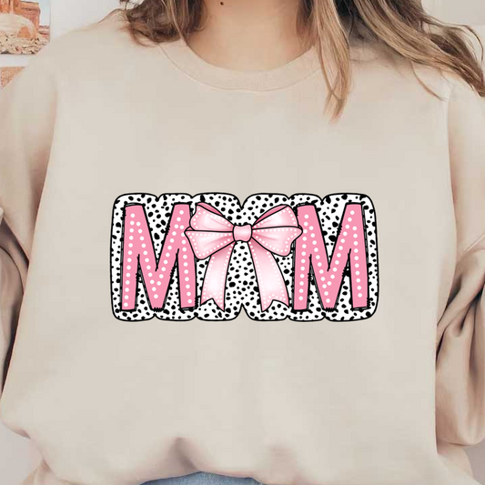 A vibrant and playful "MOM" design featuring bold pink letters and a cute polka dot background with a stylish bow. heat press transfers