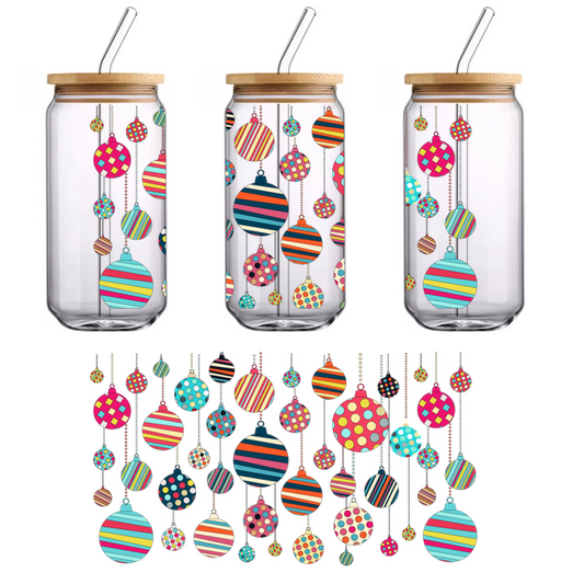 Colorful holiday ornaments in various playful patterns, including stripes and polka dots, perfect for festive decorations.UV Transfers dtf prints