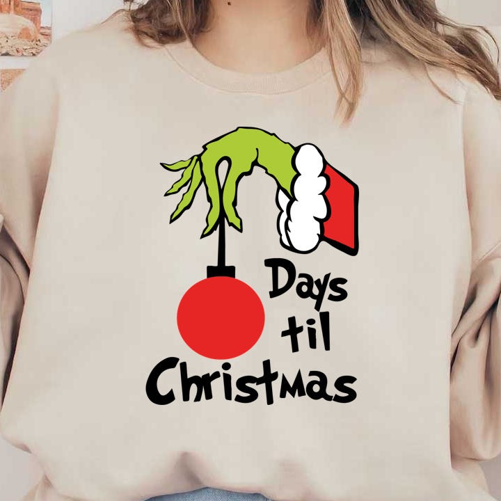 A whimsical illustration of the Grinch wearing a Santa hat, holding a red ornament, perfect for holiday cheer!DTF Transfers dtf transfers dtf prints