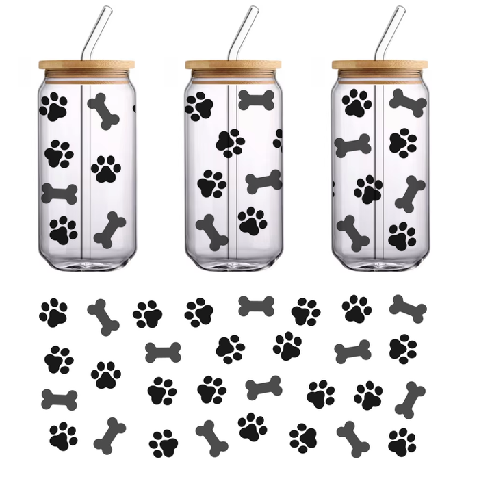 A simple and elegant black silhouette of a cat, showcasing its playful posture with a curled tail.UV Transfers dtf prints