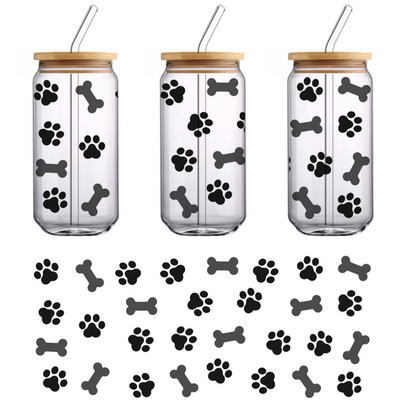 A simple and elegant black silhouette of a cat, showcasing its playful posture with a curled tail.UV Transfers dtf prints