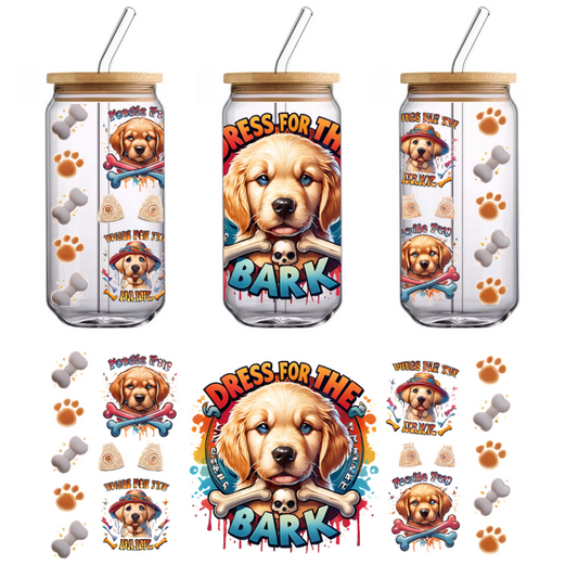 A playful graphic featuring a cute golden retriever puppy surrounded by colorful designs, bones, and the phrase "Dress for the Bark."UV Transfers dtf transfers