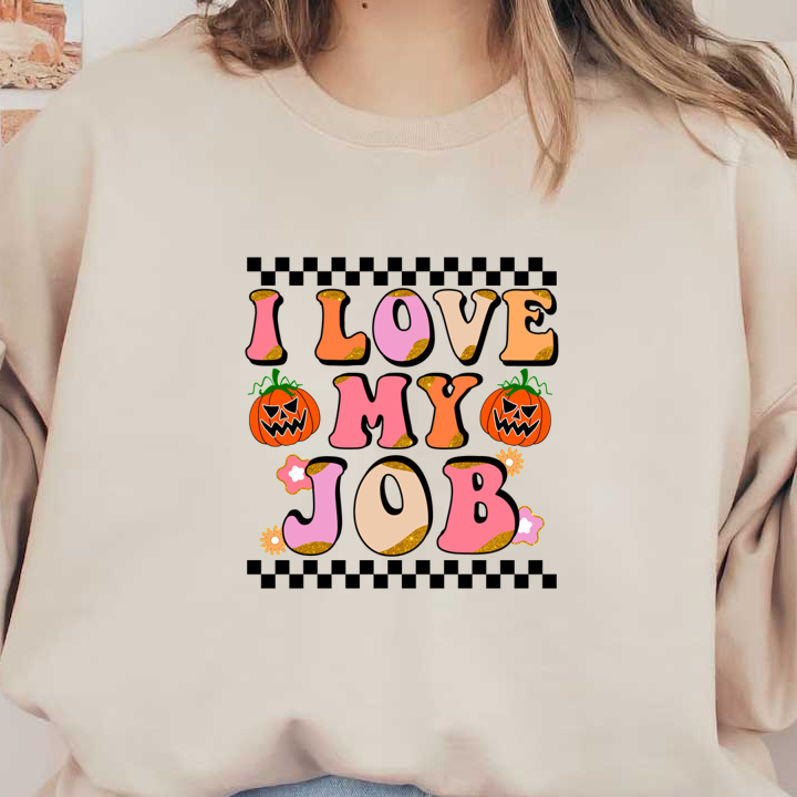 A vibrant Halloween-themed graphic featuring playful text that says "I LOVE MY JOB" alongside cute jack-o'-lanterns. dtf prints