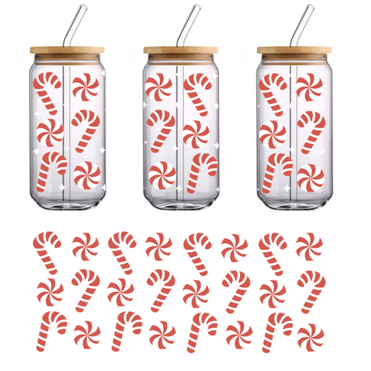 A festive pattern featuring red and white striped candy canes alongside swirl peppermint candies, perfect for holiday decorations.UV Transfers heat press transfers