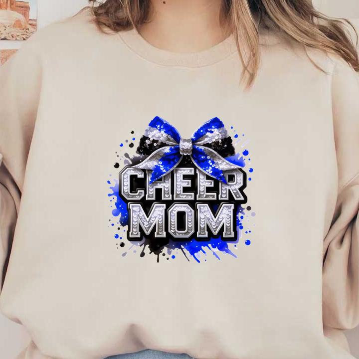 Celebrate your cheerleading spirit with this vibrant "Cheer Mom" design featuring a sparkling bow and colorful splashes!DTF Transfers dtf prints