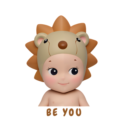 A playful illustration of a child wearing a cute lion-themed hat, encouraging the message "Be You" for self-expression.DTF Transfers dtf transfers