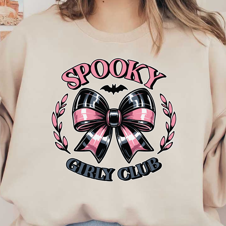 A vibrant, playful graphic featuring a black and pink bow, surrounded by decorative elements, with the text "Spooky Girly Club." dtf transfers