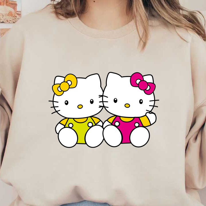 Adorable cartoon kittens dressed in vibrant yellow and pink outfits, showcasing their signature bows and cheerful expressions.DTF Transfers