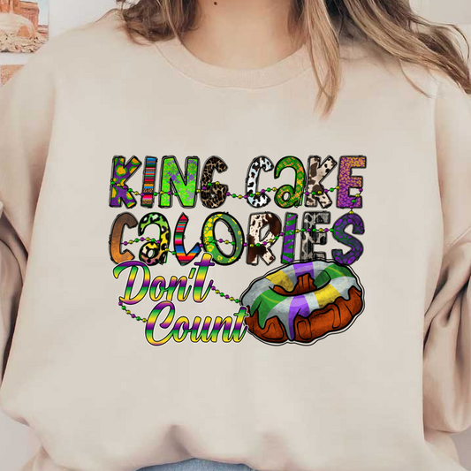 Celebrate Mardi Gras with this colorful and playful design featuring a King Cake and the fun slogan, "Calories Don't Count."DTF Transfers